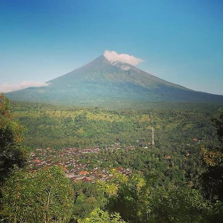 Amed Stop Inn Homestay, Rooftop Restaurant And Bar ภายนอก รูปภาพ