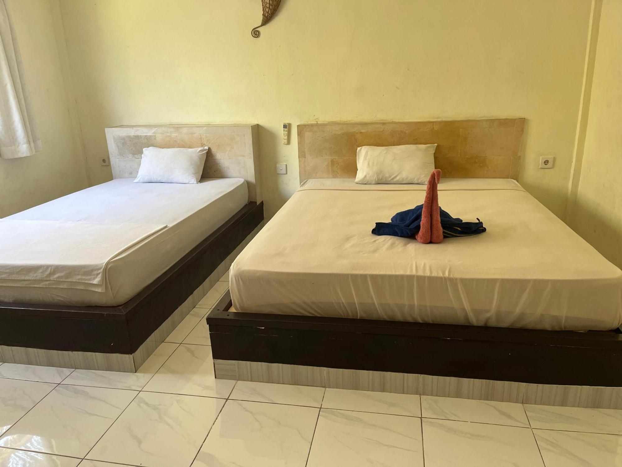 Amed Stop Inn Homestay, Rooftop Restaurant And Bar ภายนอก รูปภาพ