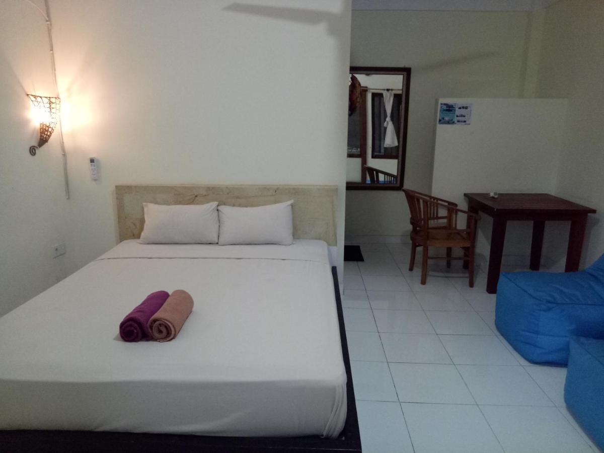 Amed Stop Inn Homestay, Rooftop Restaurant And Bar ภายนอก รูปภาพ